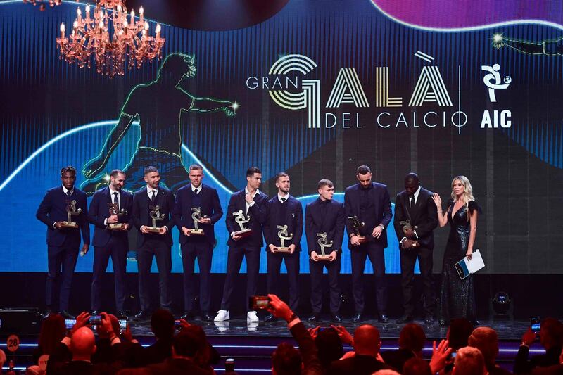 The Best XI on stage together at the Gran Gala del Calcio 2019 awards show. AFP