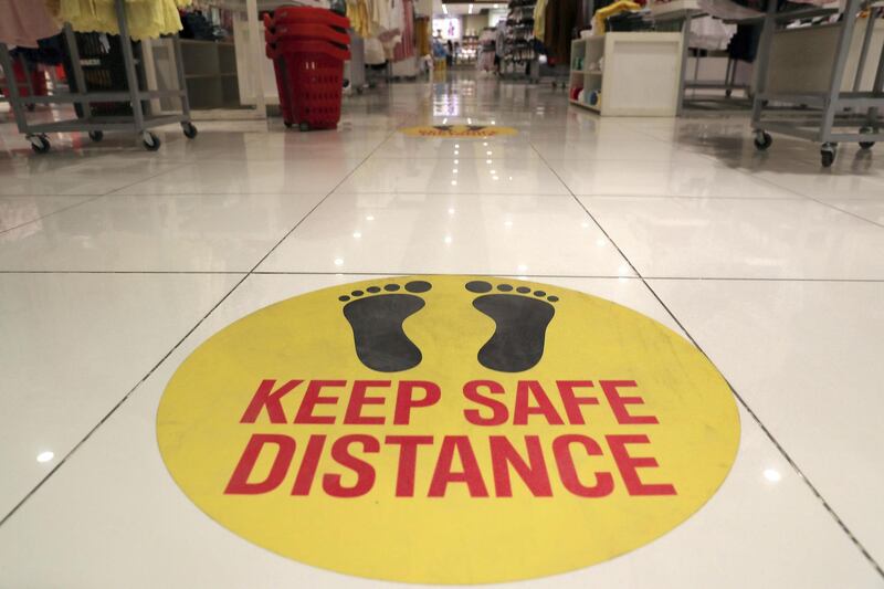 RAK, UNITED ARAB EMIRATES , May 28 – 2020 :- Safety stickers at the Redtag store at the Al Naeem City Center in Ras Al Khaimah. UAE government lift the coronavirus restriction for the residents and businesses around the country. (Pawan Singh / The National) For News/Online/Stock/Instagram. 
