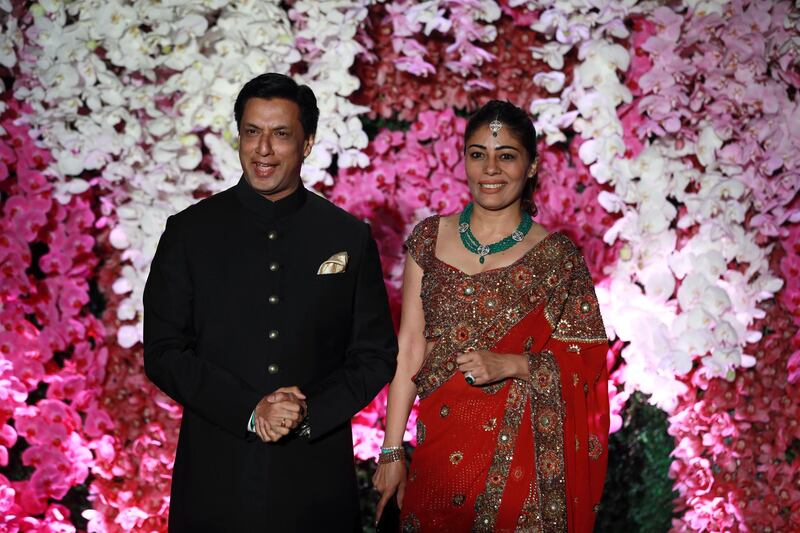Bollywood director producer Madhur Bhandarkar (L) and his wife Renu. Photo: EPA