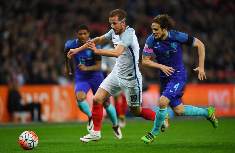 LONDON, ENGLAND - MARCH 29:  Daley Blind of the Netherlands tackles Harry Kane of England during the International Friendly match between England and Netherlands at Wembley Stadium on March 29, 2016 in London, England.  (Photo by Shaun Botterill/Getty Images)