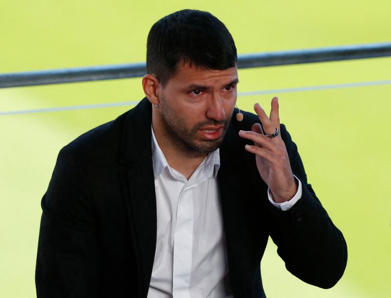 Tearful Barcelona striker Sergio Aguero after announcing his retirement from football during a press conference at Camp Nou on Wednesday, December 15, 2021. Reuters