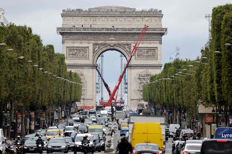 Sculptures and the Arc de Triomphe being prepared before the wrapping of the monument. AFP