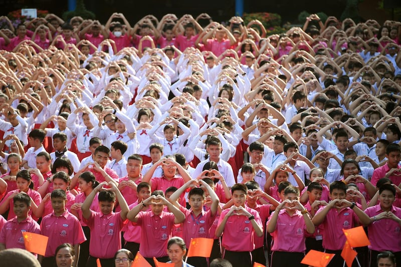 Thai students form a heart shape on Valentine's Day to show their support for China on their fight against coronavirus, in a school in Ayutthaya, outside Bangkok, Thailand. Reuters