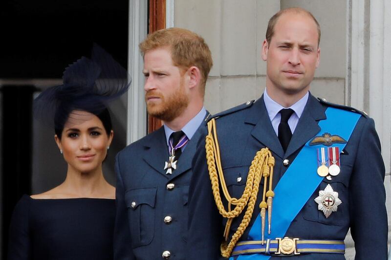 Britain's Prince Harry, Meghan and Prince William. AFP