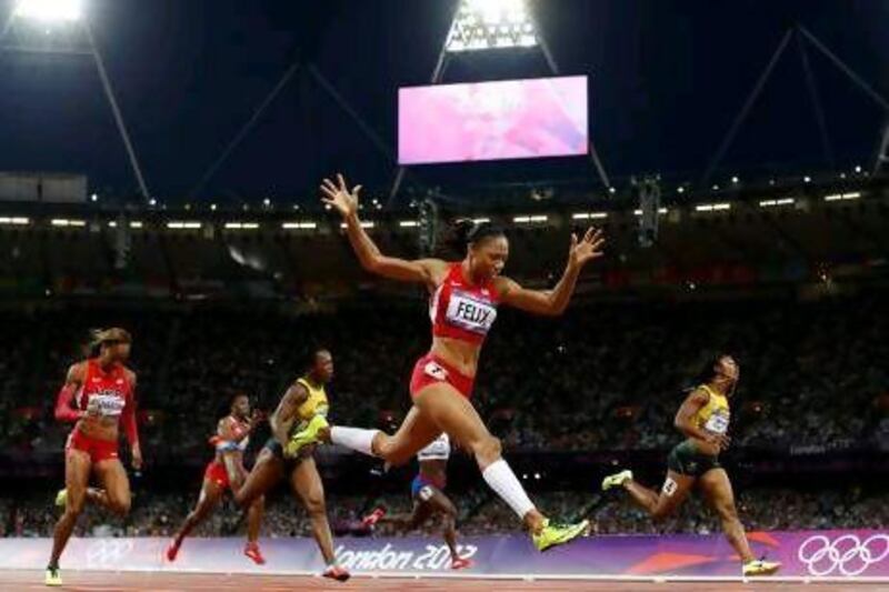 United States' Allyson Felix, second from right, beats Jamaica's Shelly-Ann Fraser-Pryce, right, to the gold in the women's 200m race.