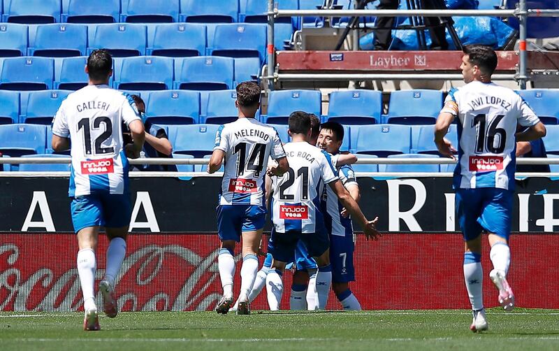 BARCELONA, SPAIN - JUNE 13: Wu Lei of RCD Espanyol celebrates with his team mates after scoring his team's second goal during the La Liga match between RCD Espanyol and Deportivo Alaves at RCDE Stadium on June 13, 2020 in Barcelona, Spain. (Photo by Eric Alonso/Getty Images)