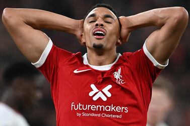 Liverpool's English defender #66 Trent Alexander-Arnold reacts after failing to score during the English Premier League football match between Liverpool and Manchester United at Anfield in Liverpool, north west England on December 17, 2023.  (Photo by Paul ELLIS / AFP) / RESTRICTED TO EDITORIAL USE.  No use with unauthorized audio, video, data, fixture lists, club/league logos or 'live' services.  Online in-match use limited to 120 images.  An additional 40 images may be used in extra time.  No video emulation.  Social media in-match use limited to 120 images.  An additional 40 images may be used in extra time.  No use in betting publications, games or single club/league/player publications.   /  