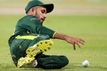 Pakistan's Mohammad Haris makes a diving stop. Afghanistan take on Pakistan in a 3 match T20 series. Sharjah Cricket Stadium, Sharjah. Chris Whiteoak / The National