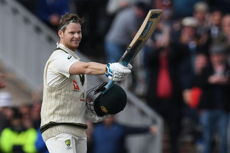 Australia's Steve Smith celebrates after reaching 200 during play on the second day of the fourth Ashes cricket Test match between England and Australia at Old Trafford in Manchester, north-west England on September 5, 2019.  - RESTRICTED TO EDITORIAL USE. NO ASSOCIATION WITH DIRECT COMPETITOR OF SPONSOR, PARTNER, OR SUPPLIER OF THE ECB
 / AFP / Paul ELLIS / RESTRICTED TO EDITORIAL USE. NO ASSOCIATION WITH DIRECT COMPETITOR OF SPONSOR, PARTNER, OR SUPPLIER OF THE ECB
