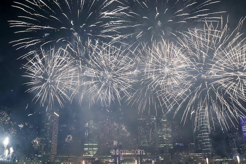 Spectacular fireworks display at the stroke of midnight to ring in the New Year 2022 on Al Maryah Island, Abu Dhabi. Khushnum Bhandari / The National 