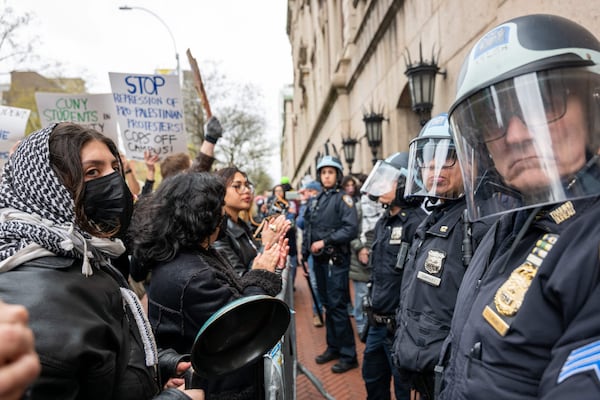Pro-Palestinian activists face police outside Columbia University in New York. Getty Images / AFP