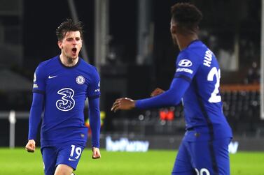 Chelsea's Mason Mount celebrates after scoring his side's opening goal during the English Premier League soccer match between Fulham and Chelsea at Craven Cottage in London, England, Saturday, Jan. 16, 2021. (Clive Rose/Pool via AP)