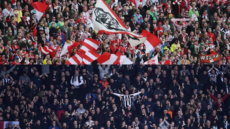BERLIN, GERMANY - FEBRUARY 22: 1. FC Koeln fans during the Bundesliga match between Hertha BSC and 1. FC Koeln at Olympiastadion on February 22, 2020 in Berlin, Germany. (Photo by Maja Hitij/Bongarts/Getty Images)

WEST BROMWICH, ENGLAND - MARCH 03: Newcastle United fans celebrate during the FA Cup Fifth Round match between West Bromwich Albion and Newcastle United at The Hawthorns on March 03, 2020 in West Bromwich, England. (Photo by Nathan Stirk/Getty Images)