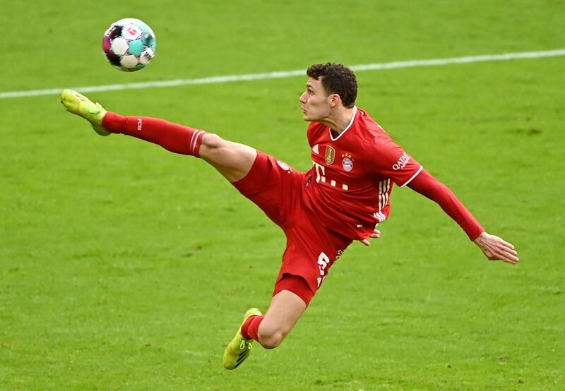 Bayern Munich's Benjamin Pavard tries to control the ball during the Bundesliga against Stuttgart at the Allianz Arena on Saturday, March 20. Bayern won the game 4-0. AP