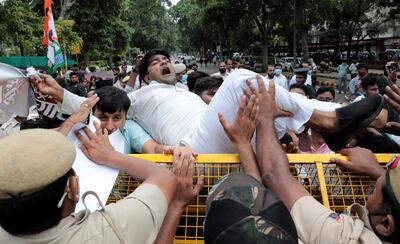 Indian Police try to control Youth Congress activists as they take part in a protest march in New Delhi. EPA