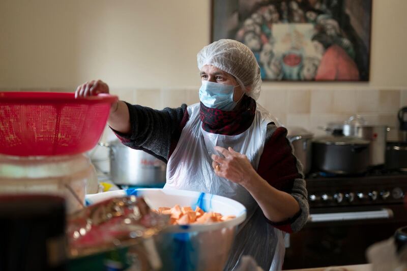 Volunteer Hardeep SIngh helps in the kitchen. AP Photo