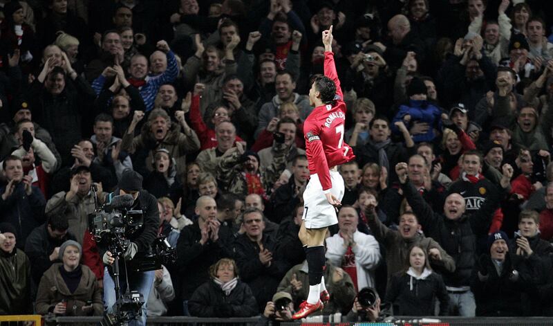 Manchester United's Cristiano Ronaldo celebrates scoring against Bolton Wanderers during the Premier League match at Old Trafford on March 19, 2008. AFP
