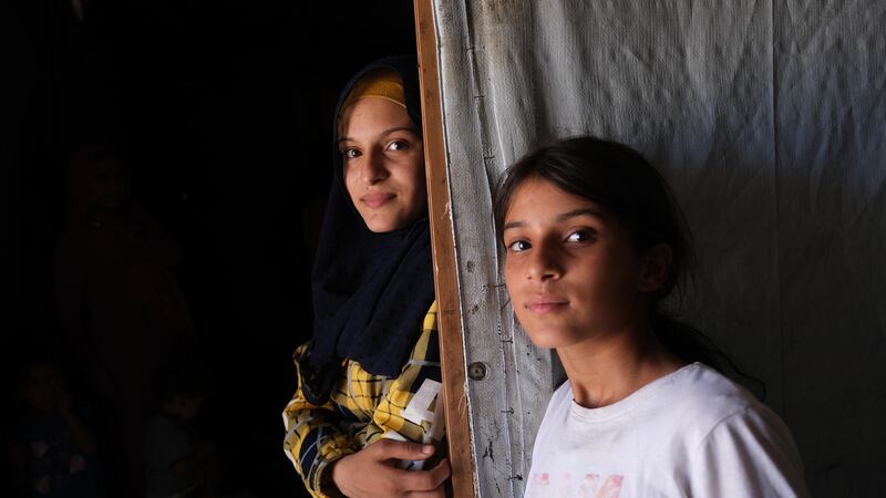 Hazar, right, dreams of being a doctor and teacher, but instead often spends her days collecting potatoes from the fields. Photo: NRC/Zaynab Mayladan