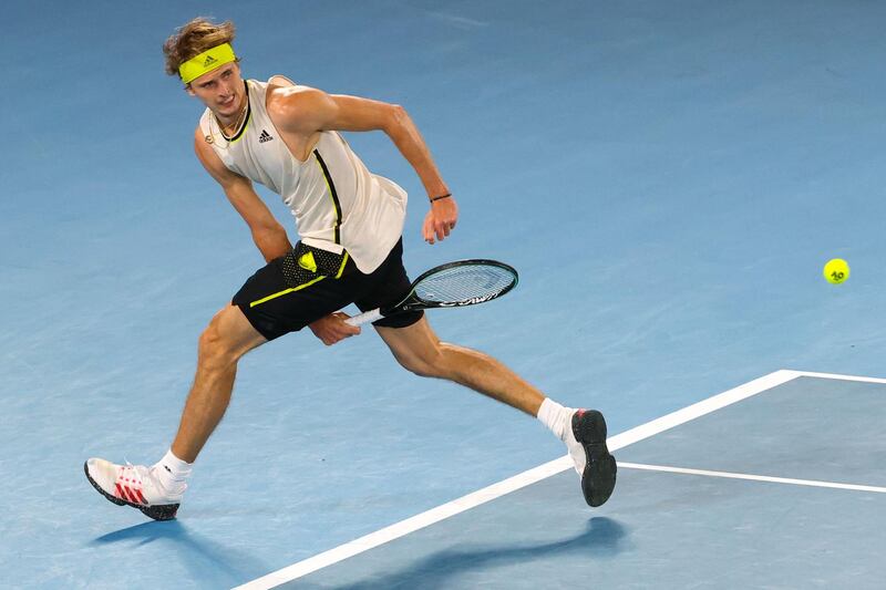 Alexander Zverev hits a hotdog return against Novak Djokovic. AFP