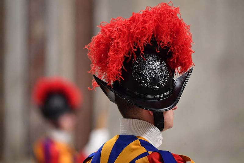Swiss Guards stand by during a Pope's mass for World Day for Consecrated Life on February 1, 2020 at St. Peter's Basilica in the Vatican. (Photo by Andreas SOLARO / AFP)