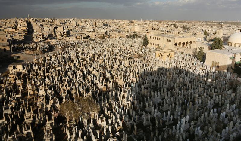 A sprawling cemetery in Maarat al-Numan, some 31km south of Idlib, Northern Syria. According to various media reports, some 30,000 people have left Maarat al-Numan, considered as the last stronghold of rebels in northern Syria.  EPA