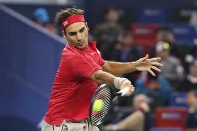 SHANGHAI, CHINA - OCTOBER 08:  Roger Federer of Switzerland returns a shot against Albert Ramos-Vinolas of Spain on day four of 2019 Rolex Shanghai Masters at Qi Zhong Tennis Centre on October 8, 2019 in Shanghai, China.  (Photo by Lintao Zhang/Getty Images)