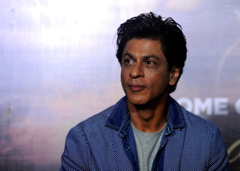 Indian Bollywood actor Shah Rukh Khan appears at a promotional event for upcoming Hindi film "Dilwale" in Mumbai on December 11, 2015. AFP PHOTO/Sujit Jaiswal / AFP / SUJIT JAISWAL