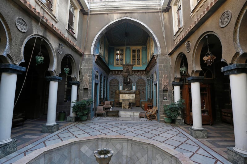 A view shows the courtyard of Naasan palace, a historical landmark, in the old part of Syria's capital Damascus on November 18, 2020. - The old city of the Syrian capital is famed for its elegant century-old houses, usually two storeys built around a leafy rectangular courtyard with a carved stone fountain at its centre. While the capital has been largely spared the violence of Syria's almost ten-year war, several of these traditional homes have been abandoned by their owners or damaged in the conflict. (Photo by LOUAI BESHARA / AFP)