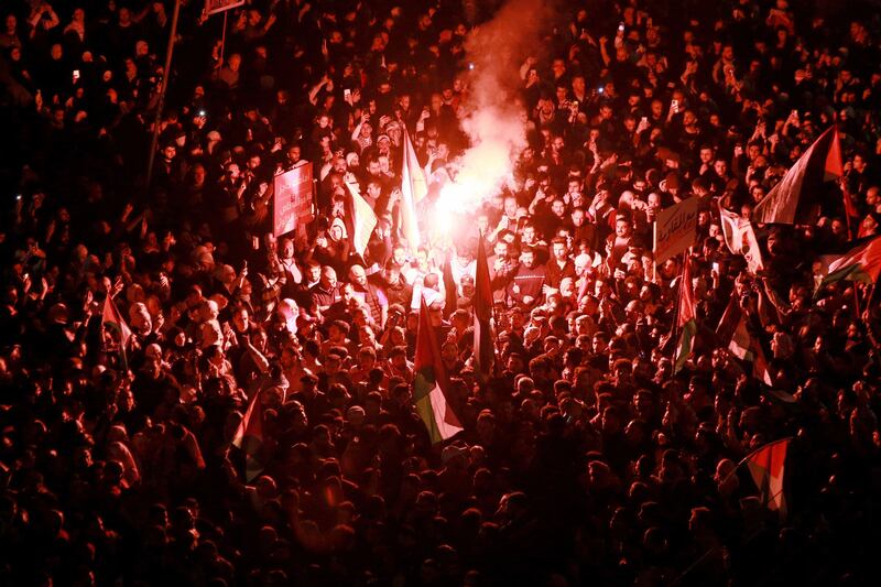 Jordanians chant slogans during a demonstration near the Embassy of Israel in Amman on March 28, 2024, in support of Palestinians amid ongoing battles between Israel and the militant Hamas group in the Gaza Strip.  (Photo by Khalil MAZRAAWI  /  AFP)