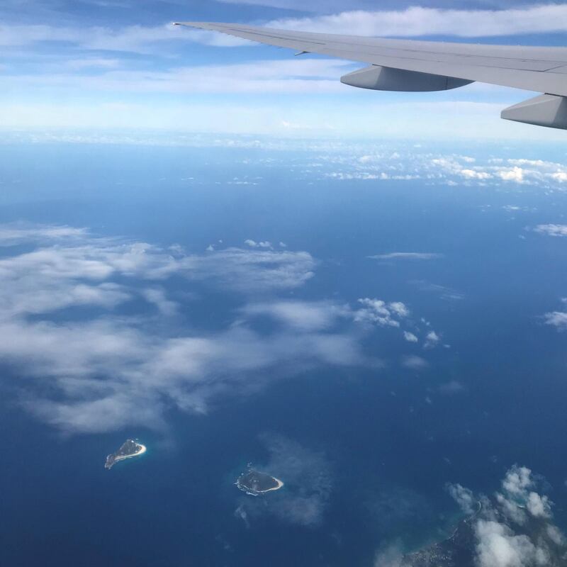 Flying over the turquoise waters of the Seychelles. Courtesy Hayley Skirka