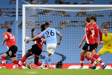 Manchester City's Riyad Mahrez (C) scores the 2-1 lead during the English Premier League soccer match between Manchester City and Southampton FC in Manchester, Britain. EPA