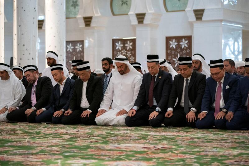 ABU DHABI, UNITED ARAB EMIRATES - June 14, 2019: HH Sheikh Mohamed bin Zayed Al Nahyan, Crown Prince of Abu Dhabi and Deputy Supreme Commander of the UAE Armed Forces (4th R) and HM King Sultan Abdullah Sultan Ahmad Shah of Malaysia (5th R), attend Friday prayers at the Sheikh Zayed Grand Mosque. Seen with members of the Malaysian delegation.

( Hamad Al Kaabi / Ministry of Presidential Affairs )​
---