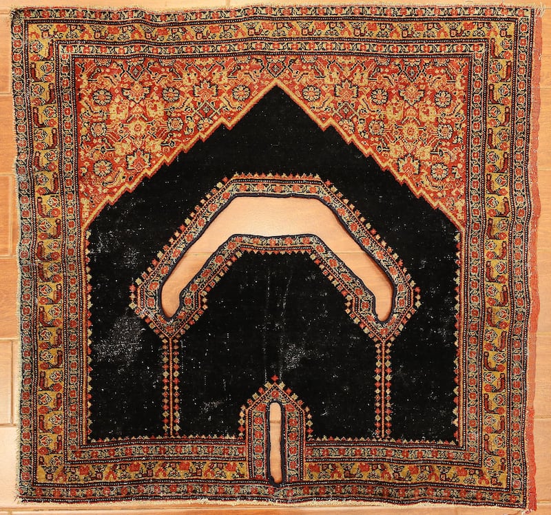 This 18th-century handmade Persian horse saddle blanket at Heritage Carpet is priced $200,000.