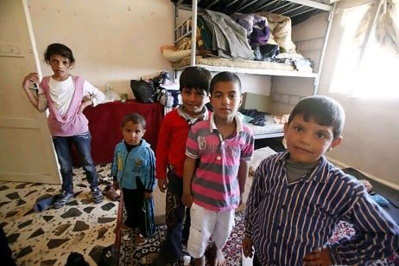 The children of Syrian refugees, who fled the violence in Syria, receive humanitarian aid and shelter in the border city of Ramtha in northern Jordan.