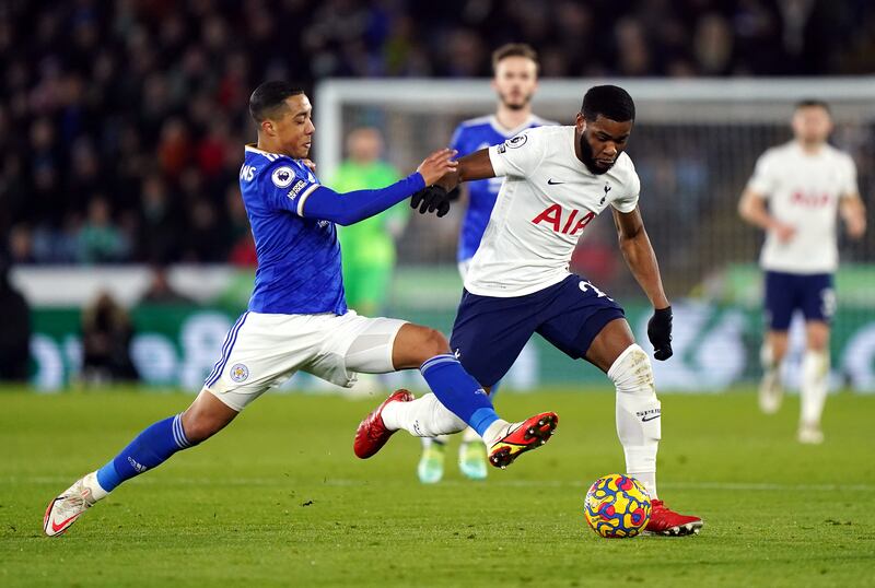 Leicester City's Youri Tielemans attempts to tackle Tottenham Hotspur defender Japhet Tanganga. PA