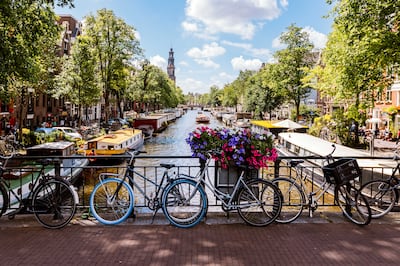 Amsterdam, Netherlands, is famed for its beautiful canals, thriving food scene and endless parades of bicycles. Getty Images