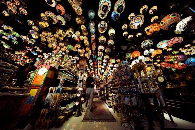 A visitor is seen walking in a lighting shop in Manama, Bahrain. Reuters