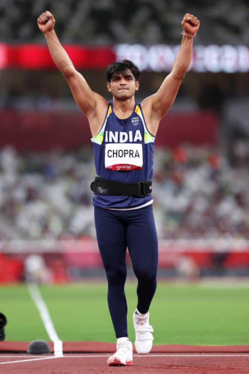 Neeraj Chopra celebrates his gold medal.