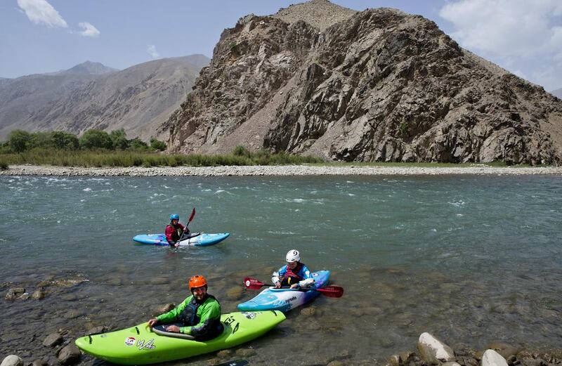 Foreign tourists kayak along the Panjshir River, north of the Afghan capital, Kabul. They are unlikely to be in Afghanistan now. AP Photos