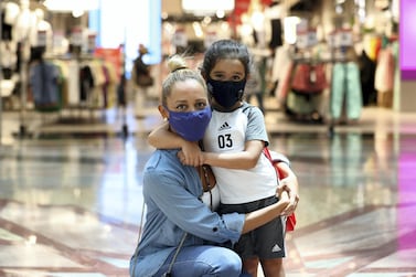 Dorsai Khaghani says she spent hundreds of dirhams on colourful face masks for her five-year-old daughter Karla. Chris Whiteoak / The National