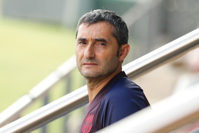 Barcelona coach Ernesto Valverde arrives to take part in a training session at the Joan Gamper Sports City training ground in Barcelona. AFP