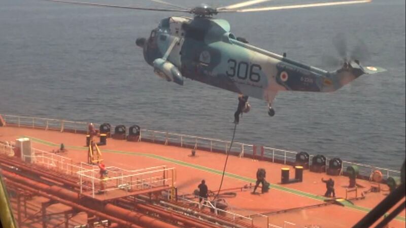 Iranian marines rappel on to the Advantage Sweet, a Marshall Islands-flagged oil tanker in the Gulf of Oman. AP