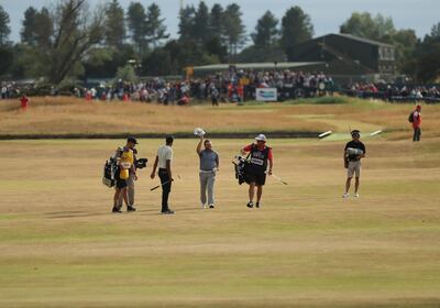 Zander Lombard of South Africa walks along the 18th fairway during the third round of the British Open Golf Championship in Carnoustie, Scotland, Saturday July 21, 2018. (AP Photo/Peter Morrison)