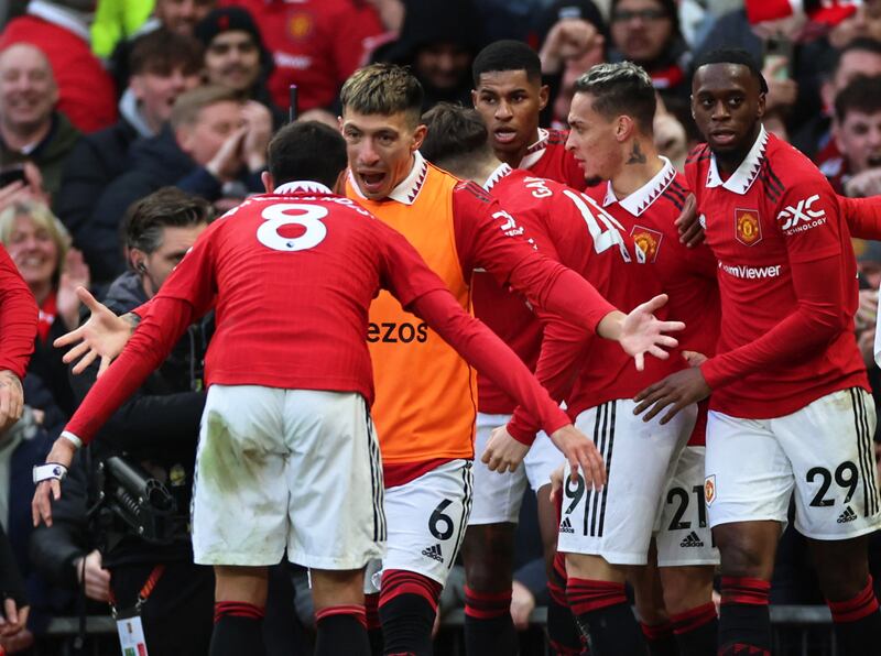 Marcus Rashford celebrates with teammates. Reuters