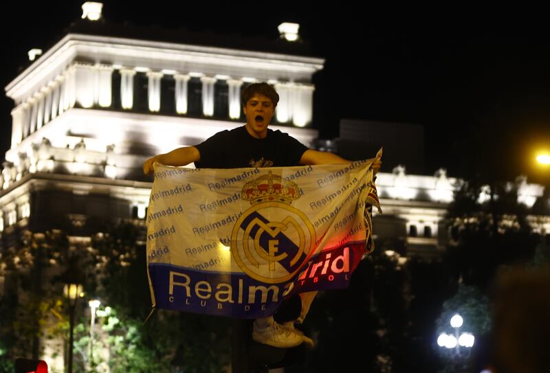 Real Madrid's supporters celebrate. EPA