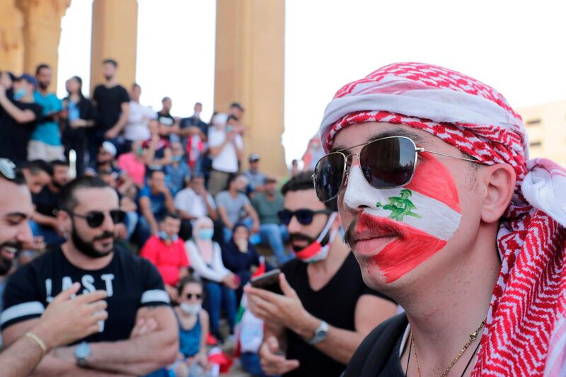 Lebanese protesters gather in front of Mohammad Al Amin mosque during the demonstration.  AFP