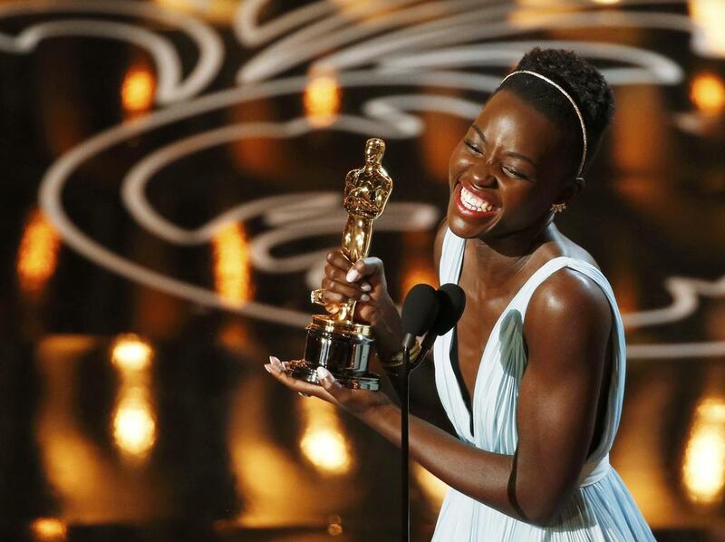 Lupita Nyong’o, best supporting actress winner for her role in “12 Years a Slave”, speaks on stage. Lucy Nicholson / Reuters