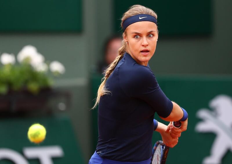 Anna Karolina Schmiedlova of Slovakia hits a backhand during the Ladies Singles first round match against Garbine Muguruza of Spain on day two of the 2016 French Open at Roland Garros on May 23, 2016 in Paris, France. (Julian Finney/Getty Images)