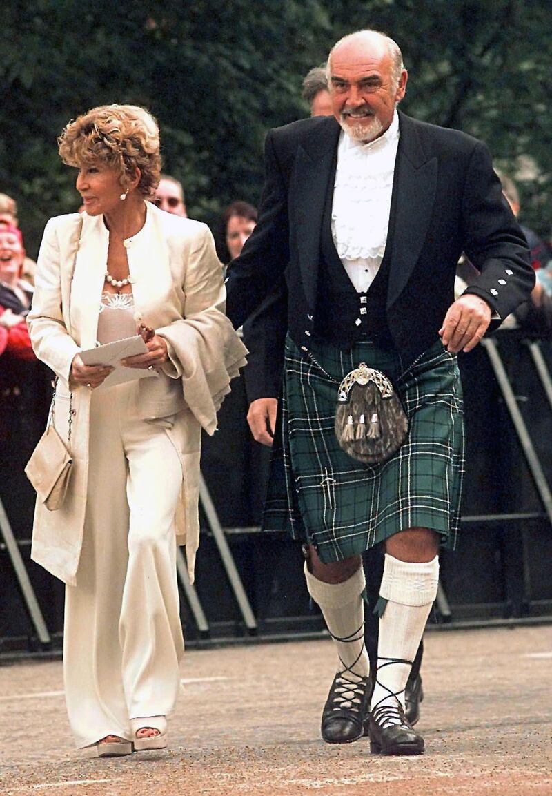 Sean Connery with his wife Micheline Roquebrune arriving at the opening of the first Scottish Parliament in Edinburgh, Scotland. EPA