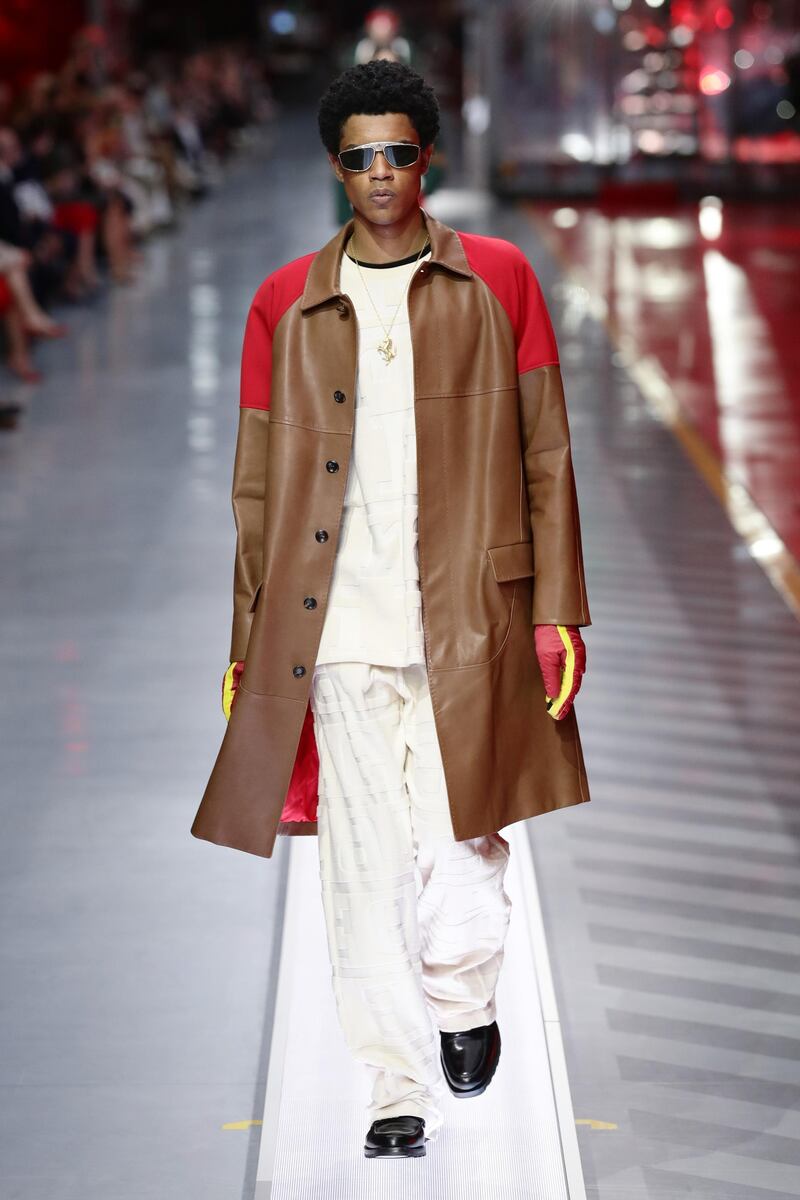 A model walks the runway at the fashion debut of the first co-ed Ferrari collection at Ferrari Factory on June 13, 2021 in Maranello, Italy. Getty Images